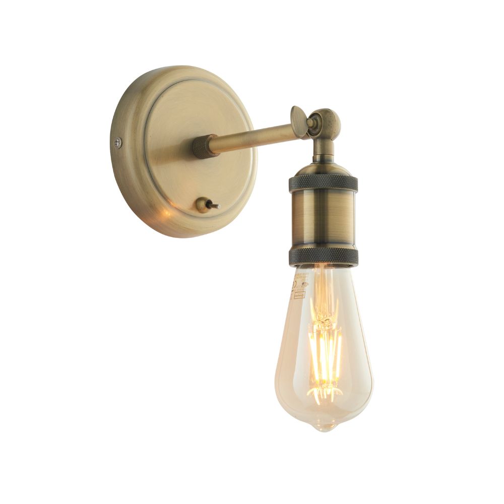 Adjustable brass wall sconce featuring an exposed filament bulb, industrial detailing, and a warm antique finish.