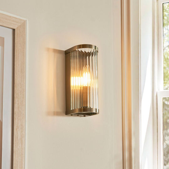 Antique Brass Curved Ribbed Glass Wall Light