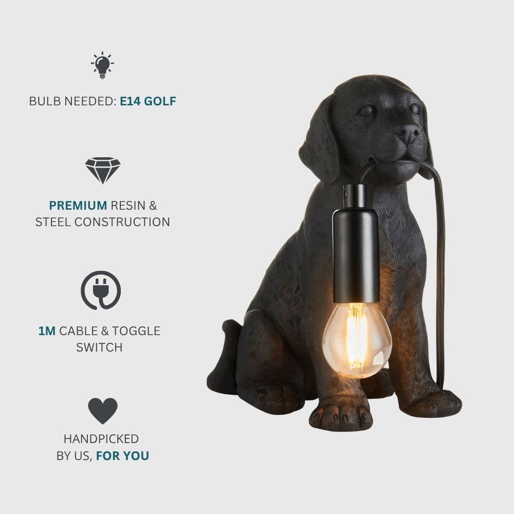 Black Labrador resin table lamp with feature icons showing E14 golf bulb requirement, premium resin and steel construction, and one metre cable with toggle switch.