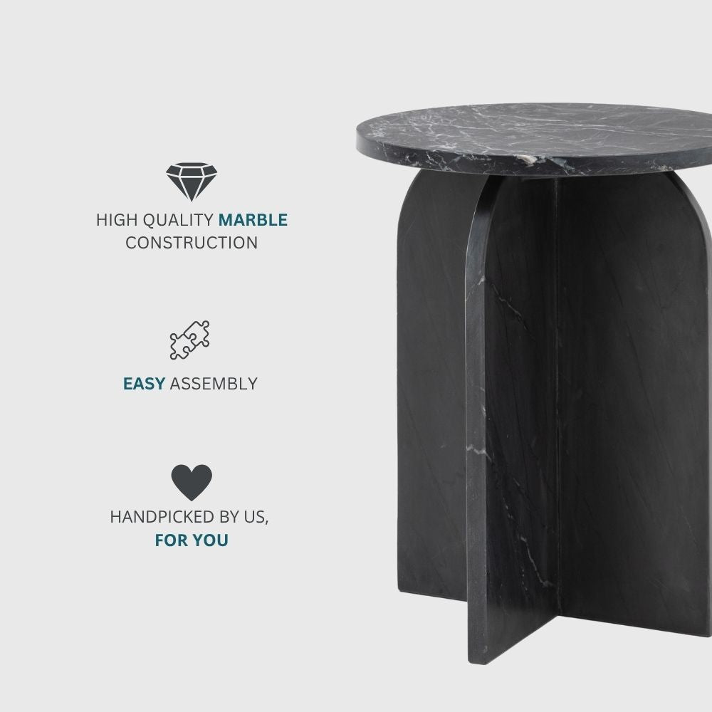 Modern black marble side table highlighting premium stone construction with sculptural base and minimalist design.