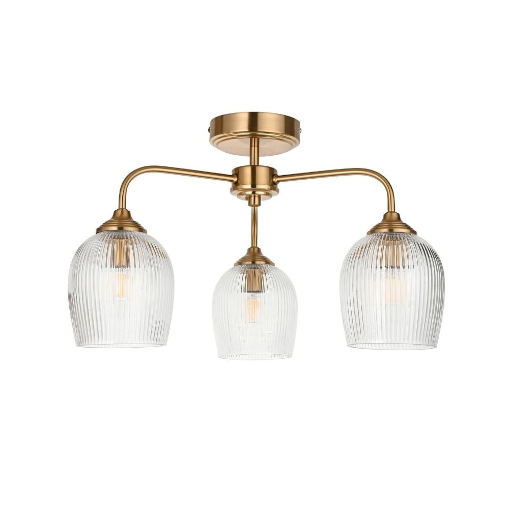 Front product view of a brass ceiling light with three arms and ribbed glass shades on a neutral background.