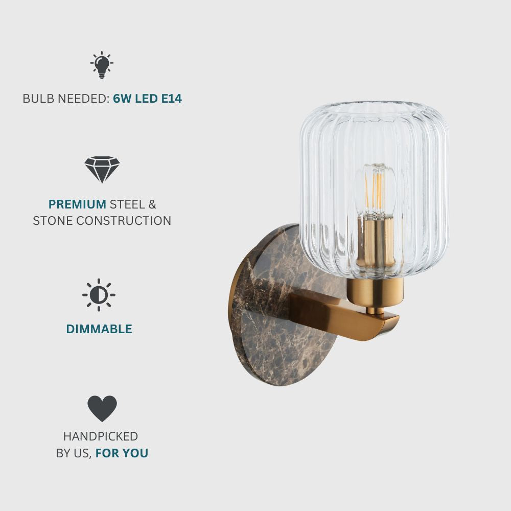 Feature card showing a brass and marble wall light with ribbed clear glass shade, dimmable function and premium steel and stone construction.