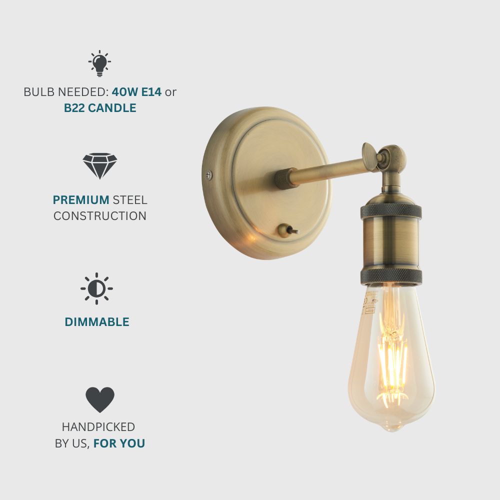 Industrial brass wall light with a dimmable Edison bulb, antique brass finish, and exposed bulb holder design.