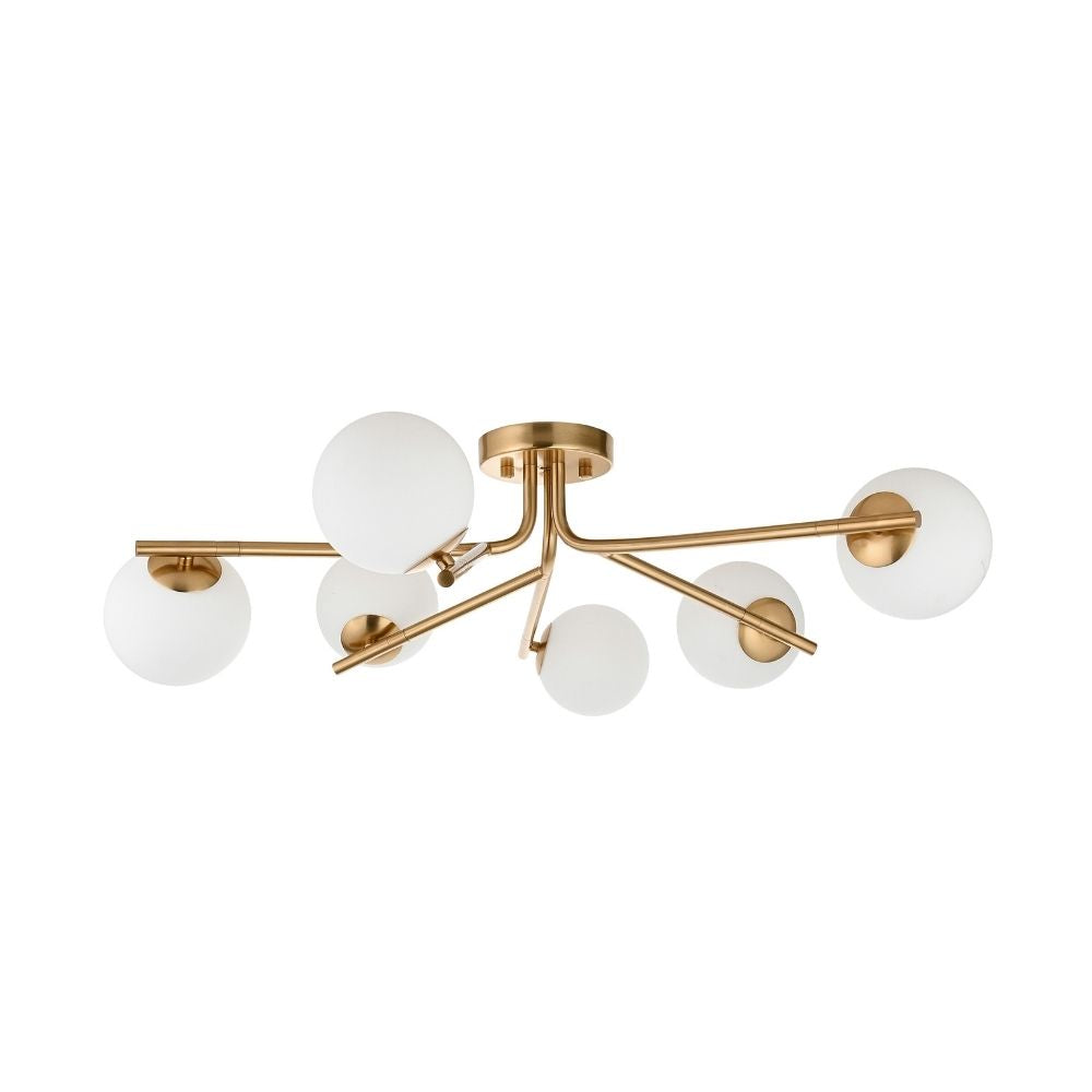 Modern brass ceiling light with multiple extending arms and round frosted glass globe shades on a white background.
