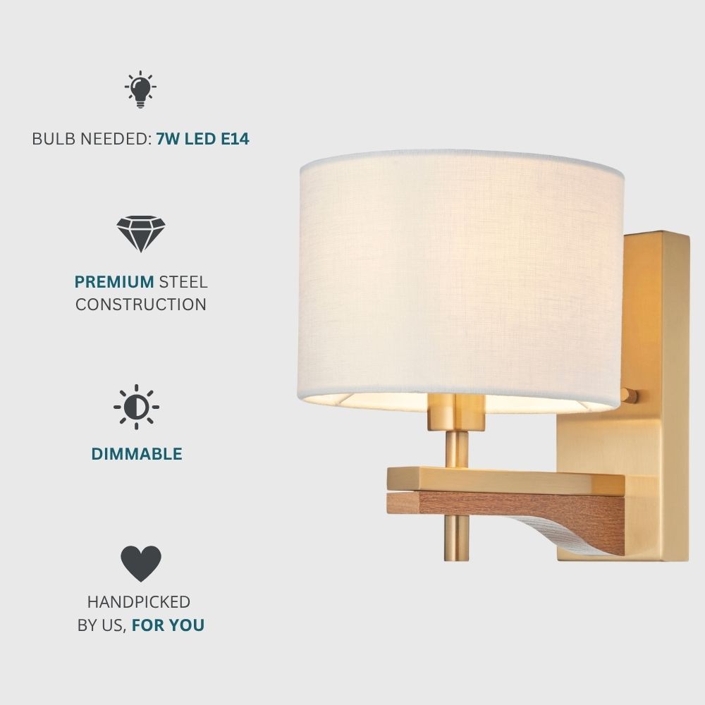 Brass wall light with linen shade requiring E14 LED bulb, dimmable and made from premium steel construction.