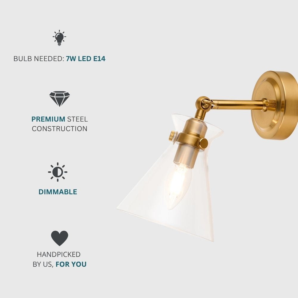 Brass wall light with clear glass shade requiring E14 LED bulb, dimmable and made from premium steel construction.