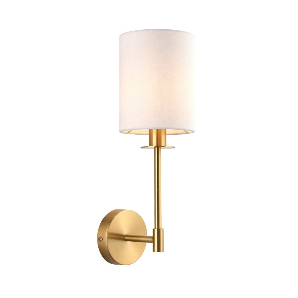Modern brass wall light featuring a white cylindrical fabric shade isolated on a neutral background.