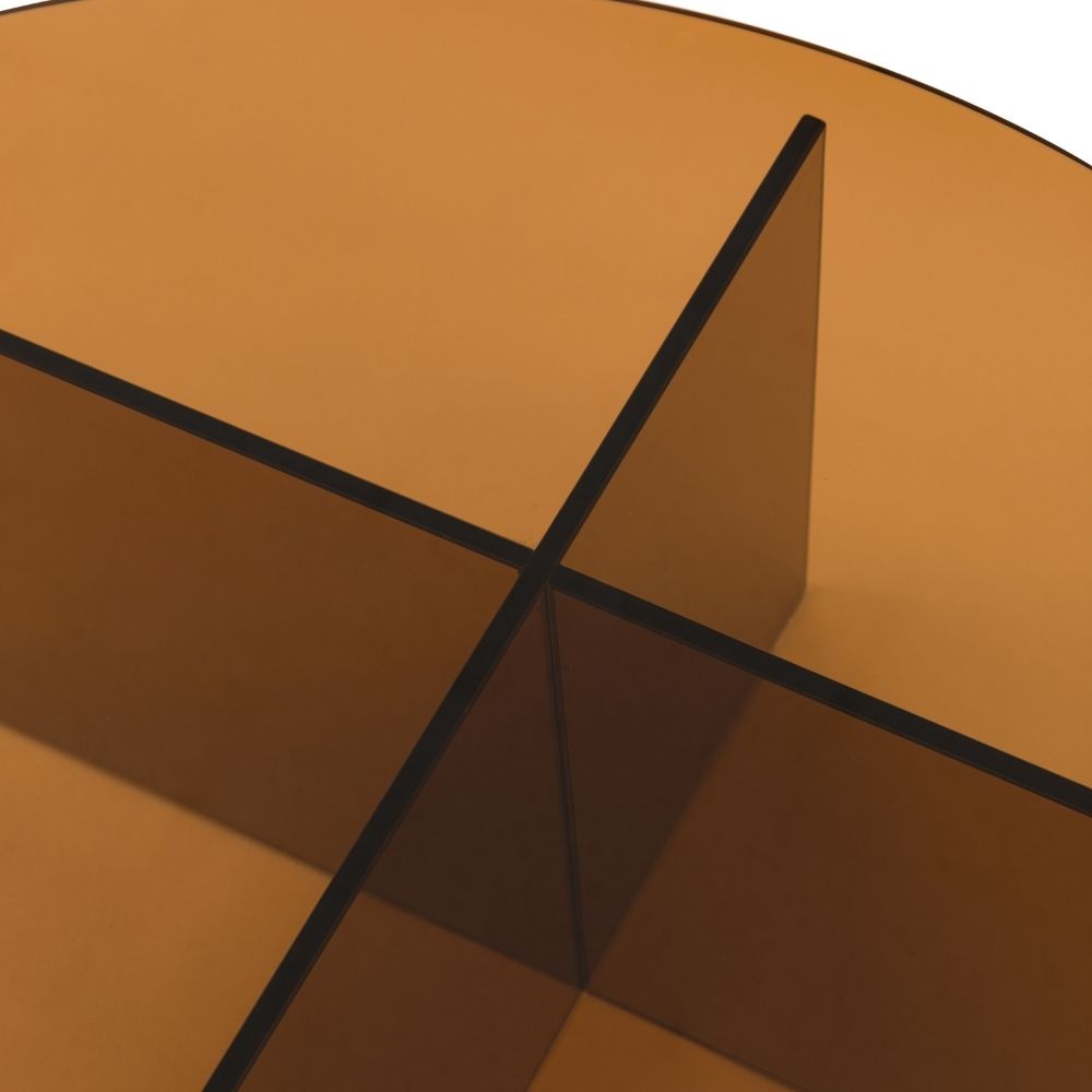 Detailed close up of intersecting glass panels forming the cross base of a bronze glass coffee table.