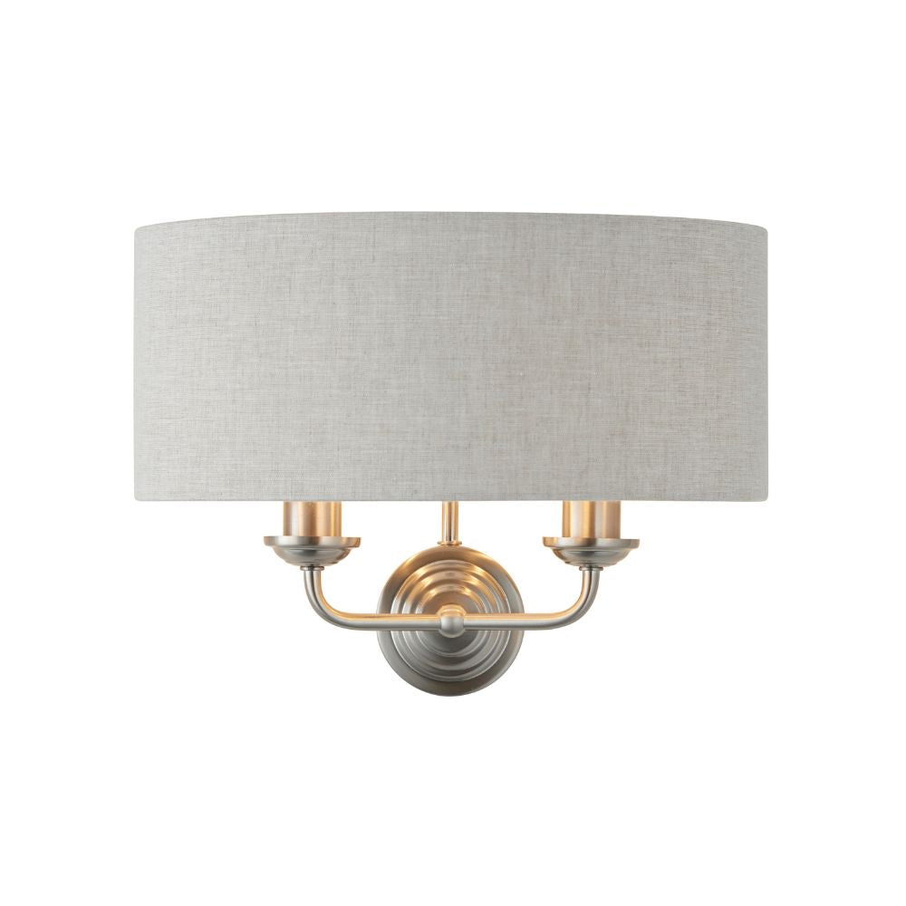 Brushed steel double wall light with a wide grey fabric shade and minimalist styling suitable for modern interiors.