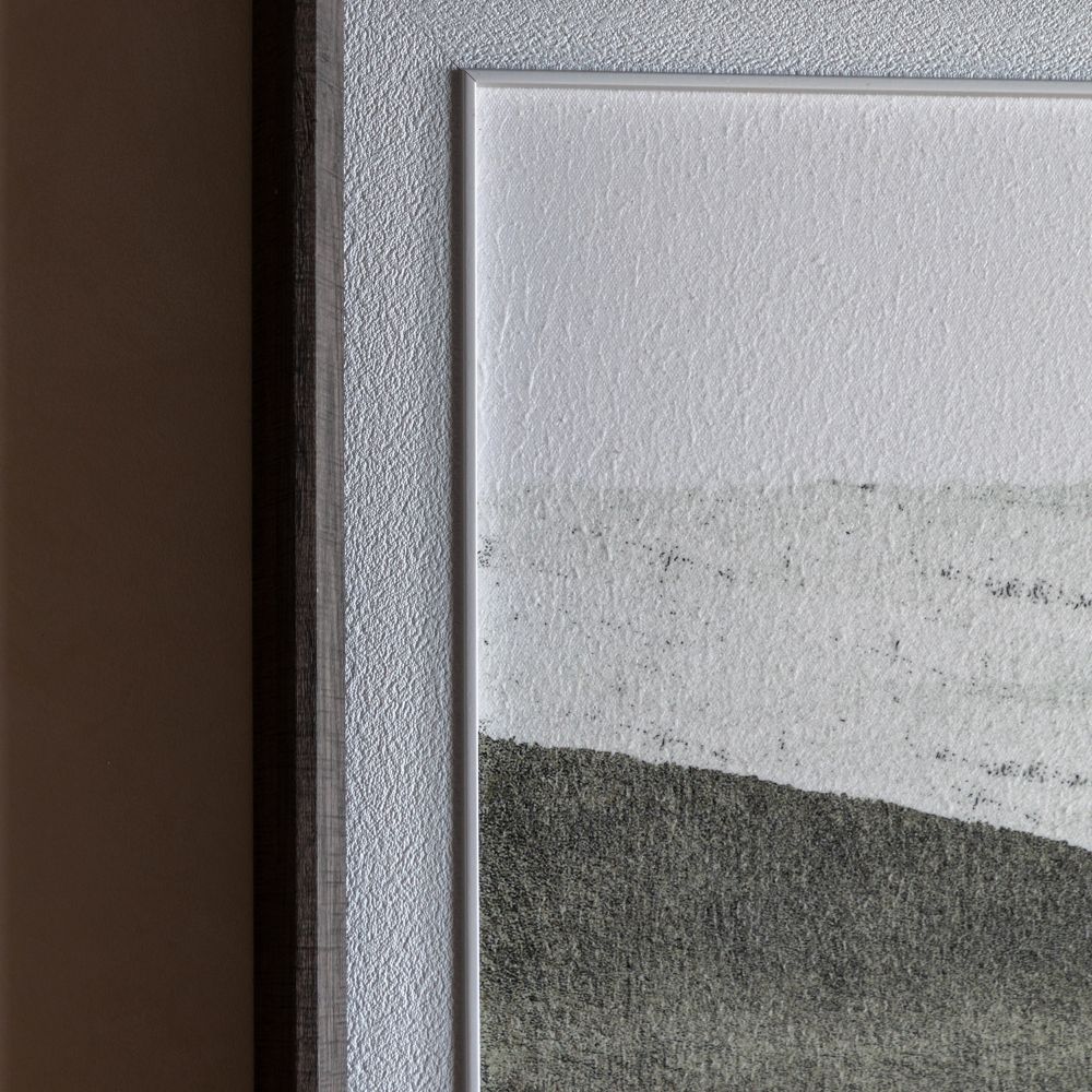 Close-up detail of textured abstract landscape artwork with layered neutral tones and contemporary framed finish.