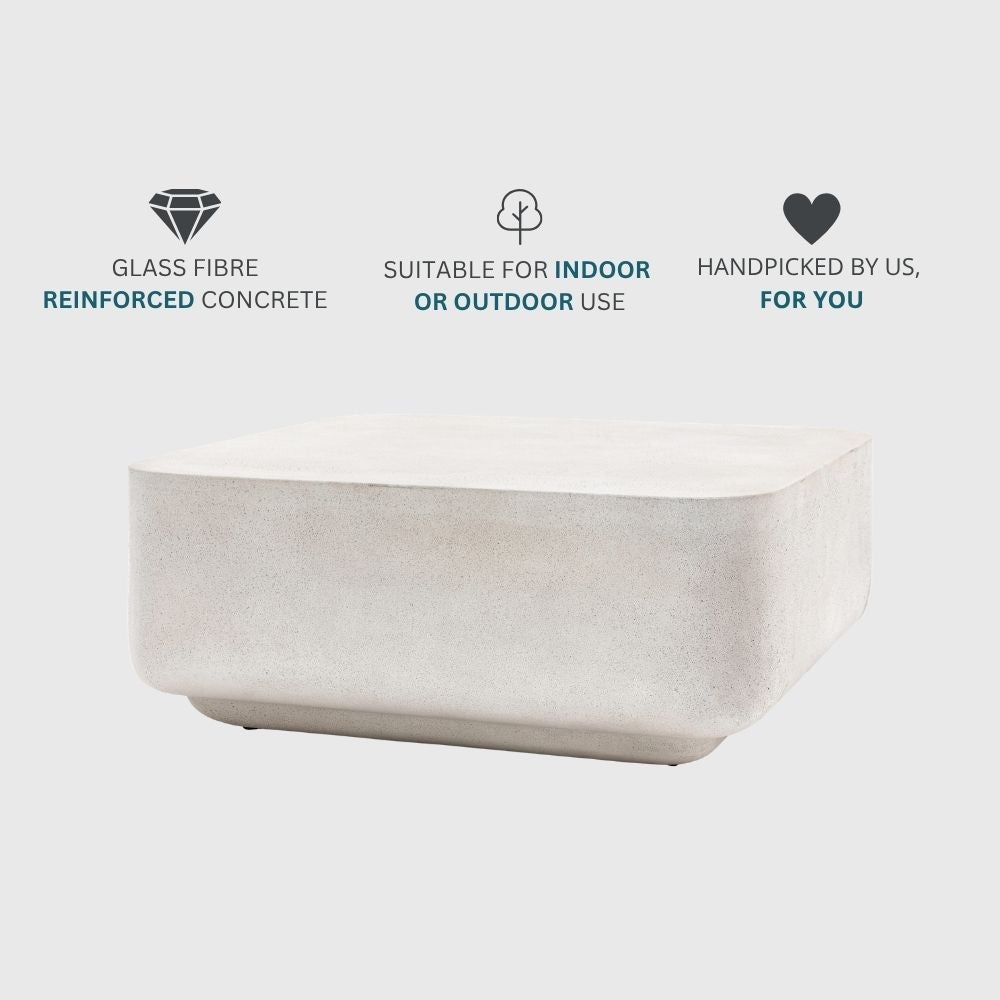 Concrete effect coffee table with icons highlighting glass fibre reinforced construction and suitability for indoor or outdoor use.