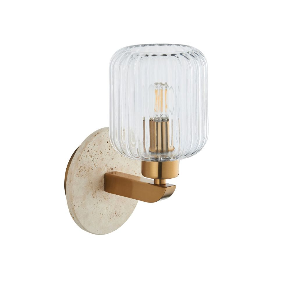 Contemporary brass wall sconce featuring a clear ribbed glass shade and elegant natural stone-effect circular backplate.