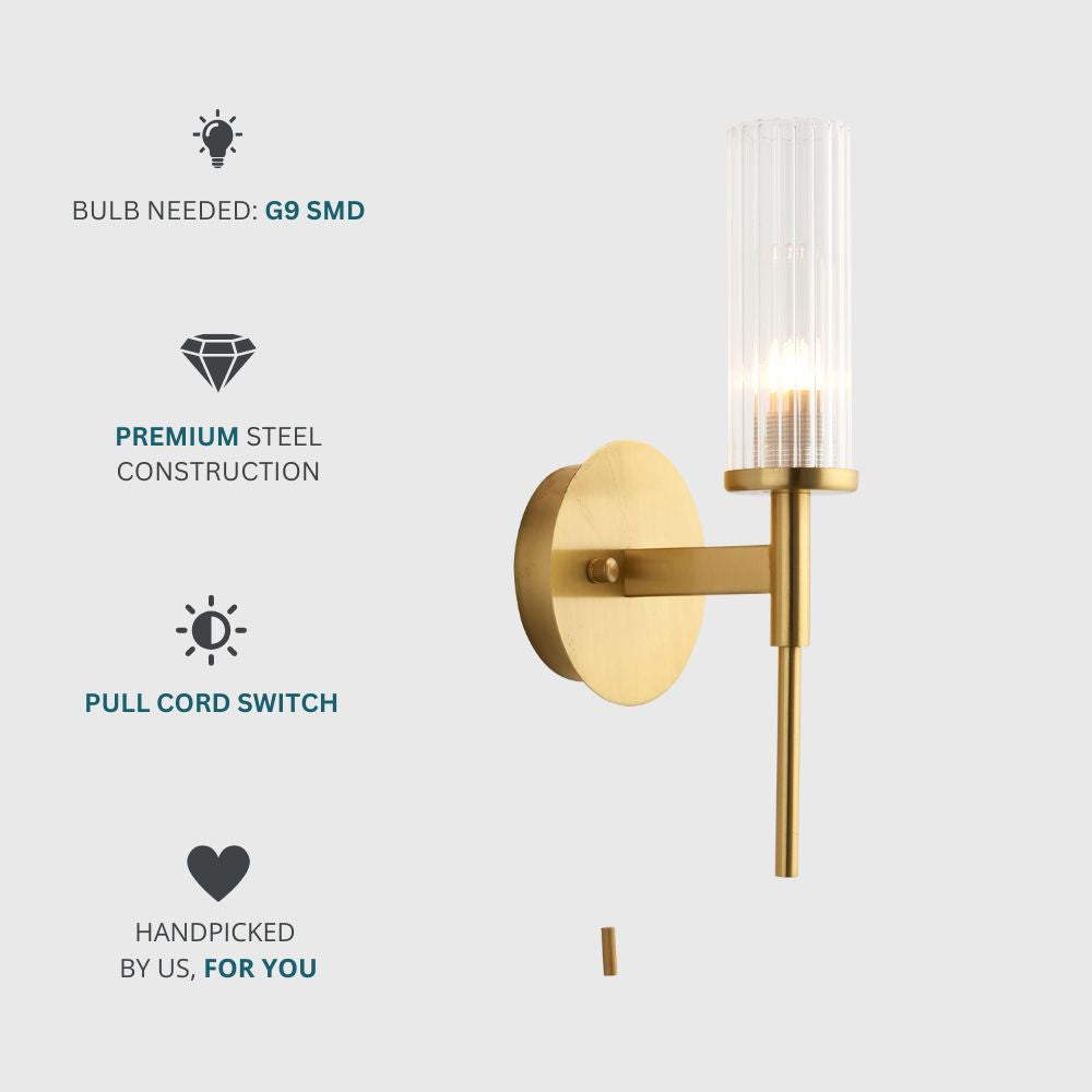 Dimmable brass wall-mounted light with a clear fluted glass shade designed for a G9 SMD bulb and premium steel construction.
