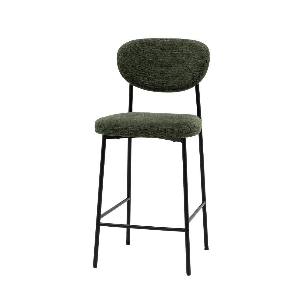 Green fabric upholstered bar stool with curved backrest, padded seat and black metal legs shown against a plain light background.