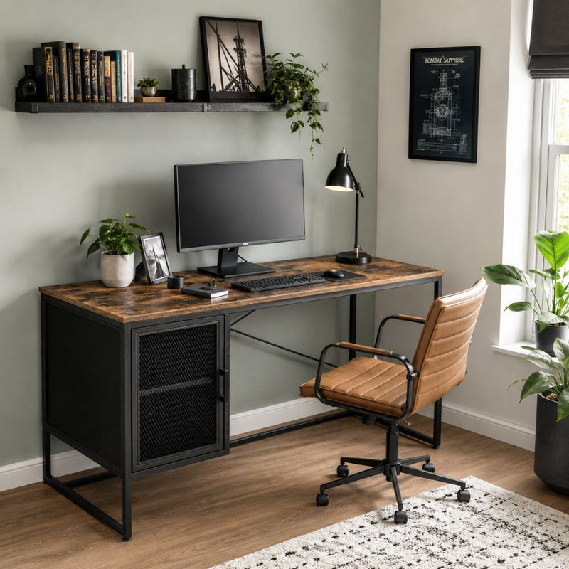 Industrial-style home office desk with rustic wood-effect top, black metal frame, storage cabinet, computer monitor, and brown office chair in a modern workspace.
