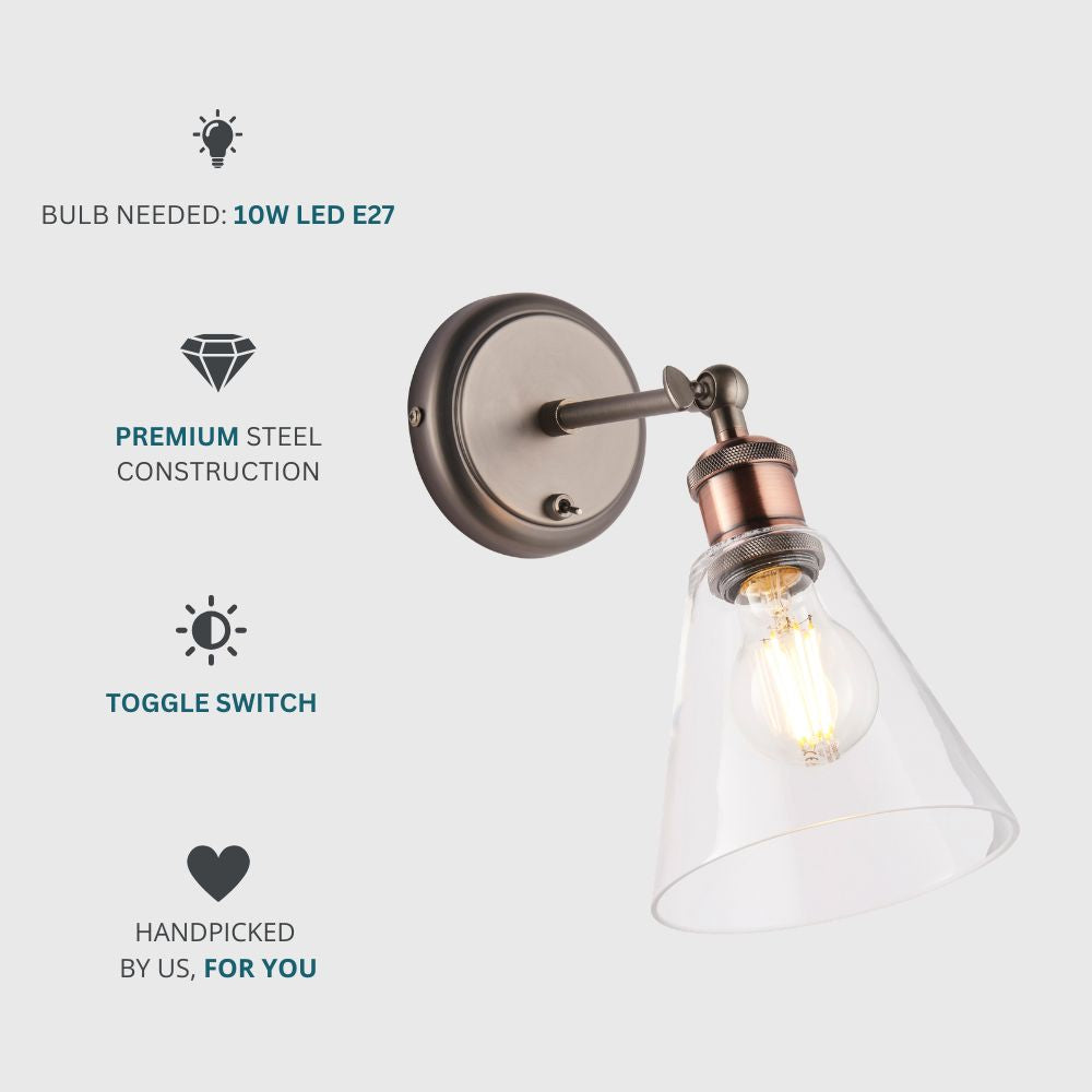 Industrial wall light with a clear glass shade, exposed LED bulb and integrated toggle switch.