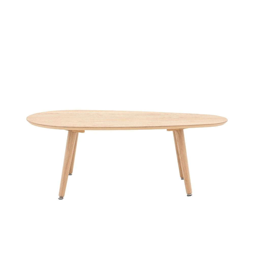 Minimalist oval coffee table in natural oak with clean Scandinavian design and tapered wooden legs on a plain background.