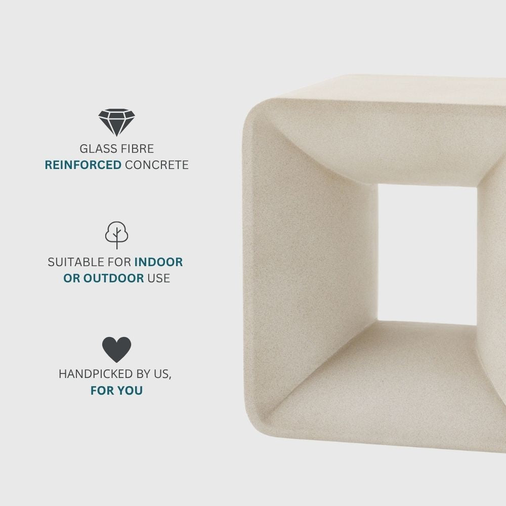 Neutral concrete side table highlighting glass fibre reinforced construction suitable for indoor and outdoor use.