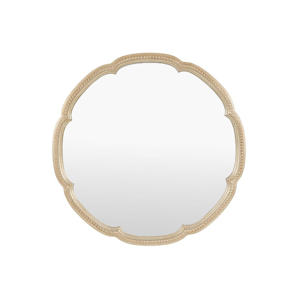 Scalloped round wall mirror with an antique gold frame and decorative beaded edging isolated on a light grey background.