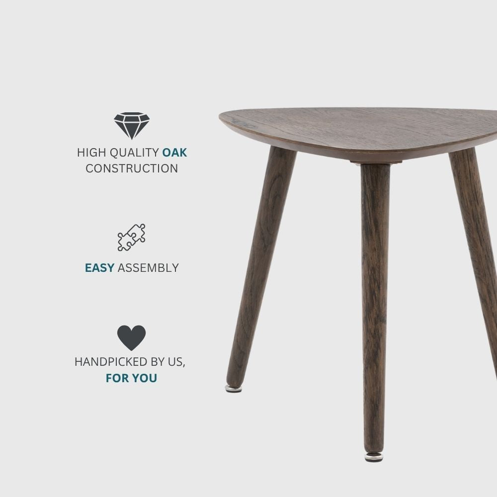 Modern smoked oak side table highlighting high quality oak construction with minimalist triangular shape and sturdy tapered legs.
