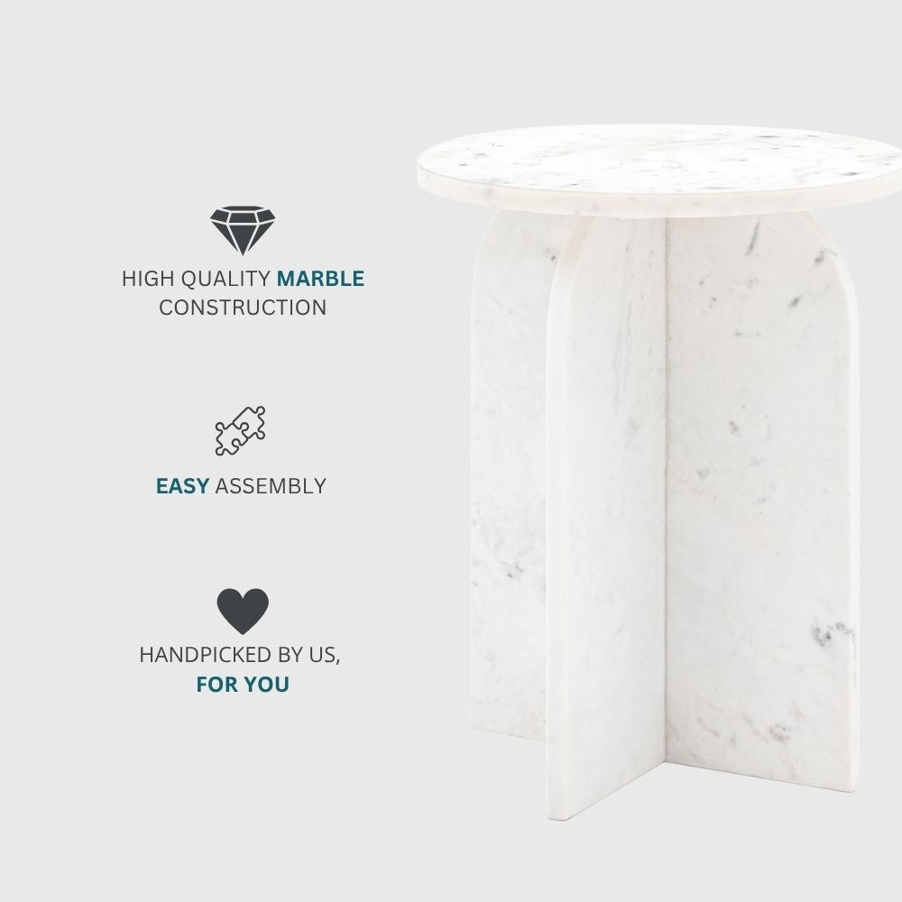 Modern white marble side table showcasing high quality stone construction with smooth sculptural base and minimalist aesthetic.