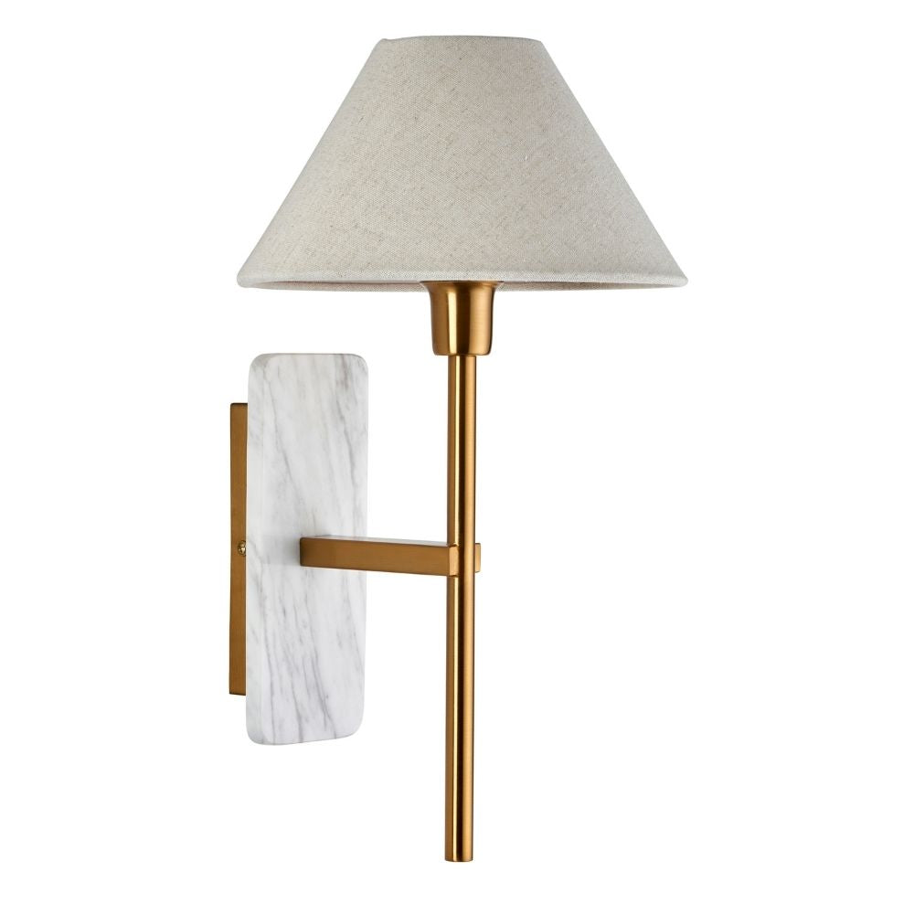 Modern wall sconce with smooth white marble backplate, slim brass stem and tapered linen lampshade on a clean background.