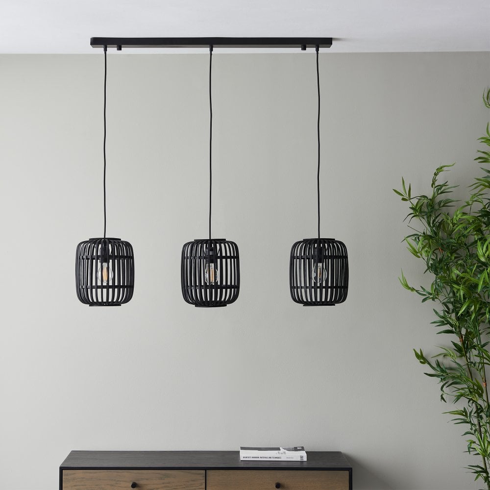 Modern and elegant linear 3-pendant ceiling light crafted from black-finished steel and bamboo, perfect for adding warmth and sophistication to any dining or living space.
