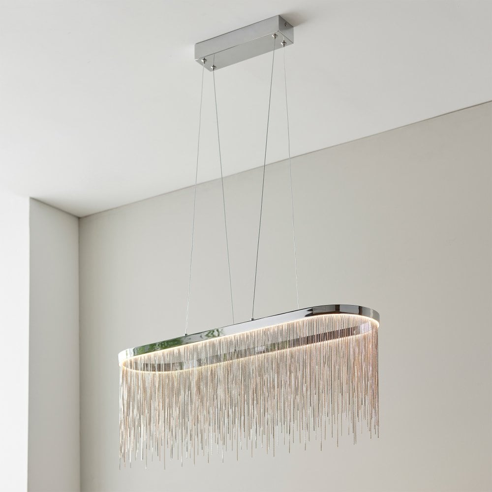 Elegant oval waterfall LED ceiling light in a sleek chrome finish, designed to add a touch of modern sophistication to any room. Adjustable cable for a customisable hanging height.
