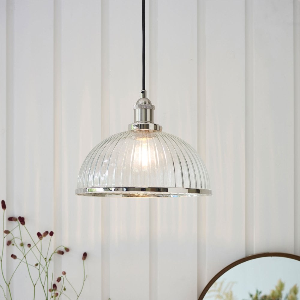 Stylish retro-style industrial pendant light in nickel, perfect for adding a vintage touch to any space.
