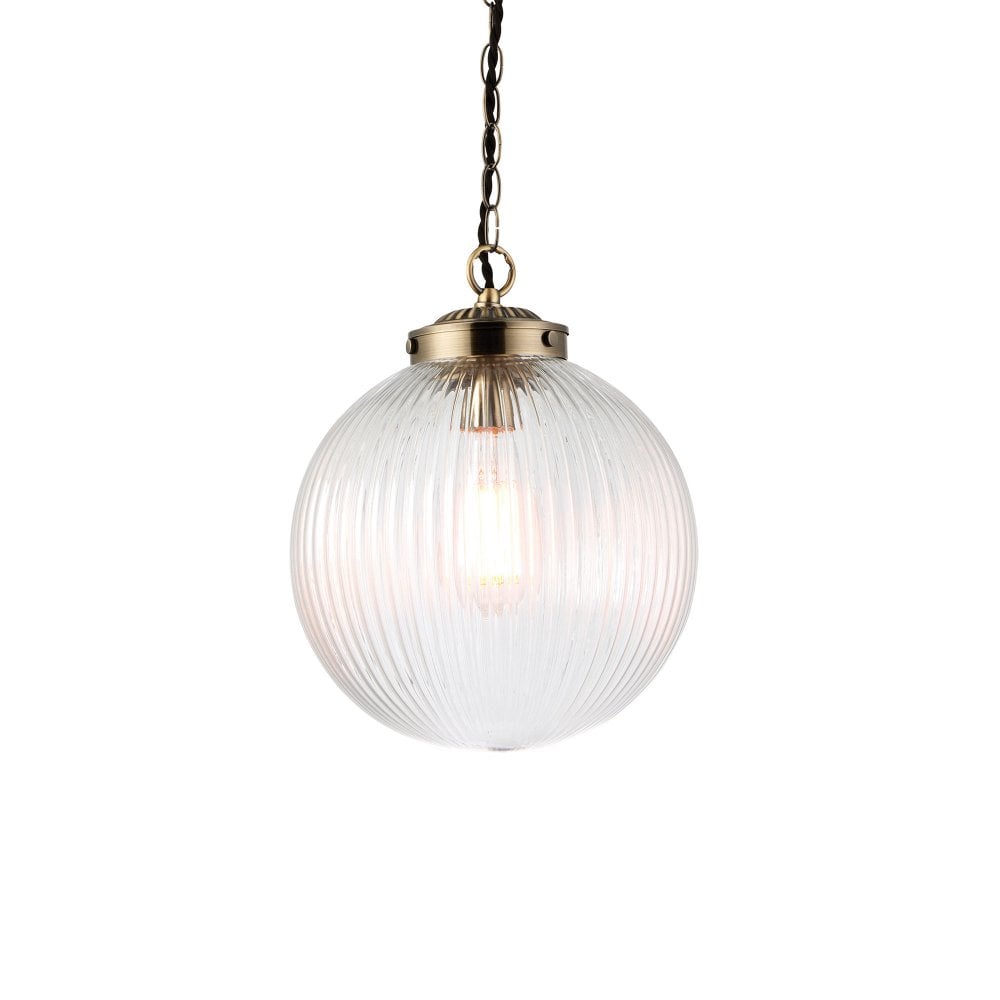Classic antique brass ribbed pendant light, designed to bring warmth and timeless style to your décor.
