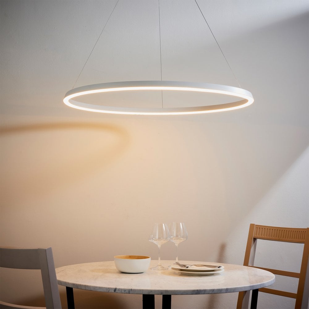 A stunning white circular pendant light with a contemporary aesthetic, constructed from aluminium, alloy, and acrylic. Perfect for adding elegance to living rooms, kitchens, or bedrooms with an adjustable hanging length.
