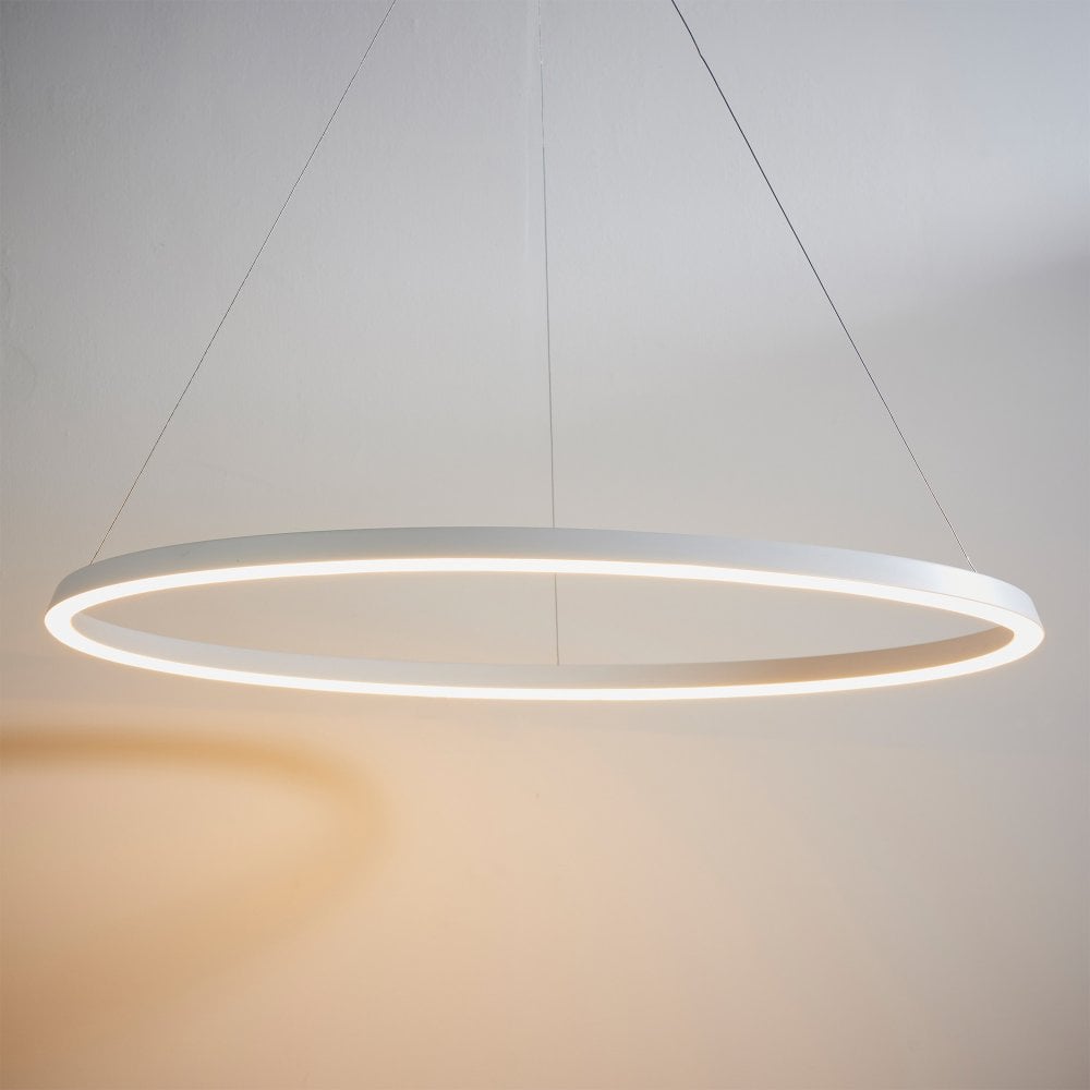 A sleek and modern circular pendant light in white, crafted from aluminium, alloy, and acrylic, offering a stylish touch to any interior space. Adjustable cable length ensures easy installation.
